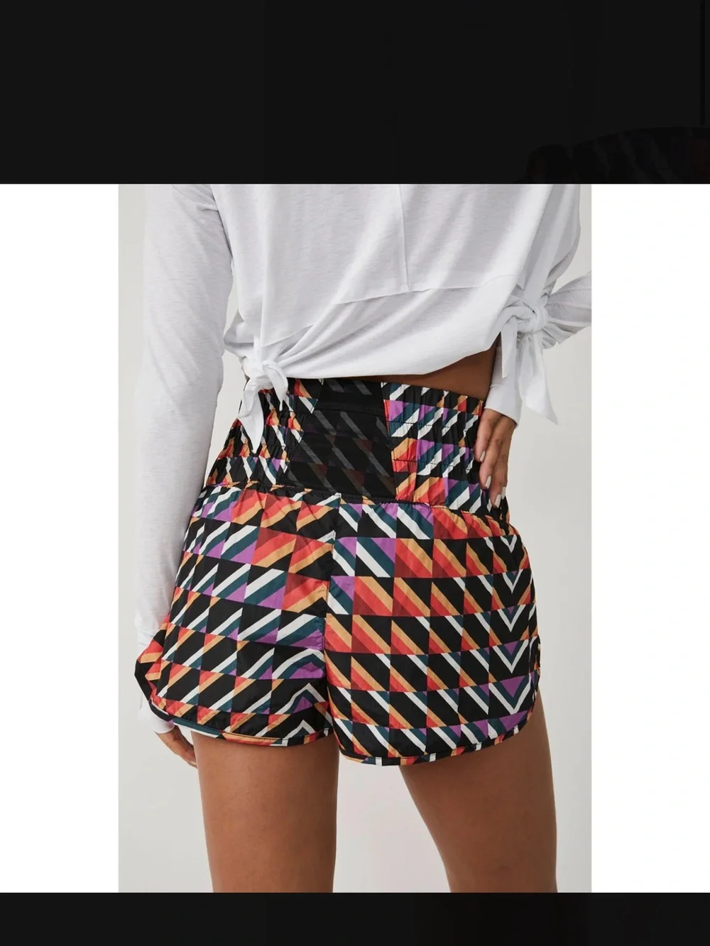 NWT Free people movement Orange crush combo print athletic shorts size Xs